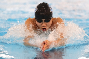 Seneca's Haihan Xu competes in the 100-meter breaststroke at WPIAL Championships at Upper St. Clair Sunday. Seb Foltz/Butler Eagle 03/07/21
